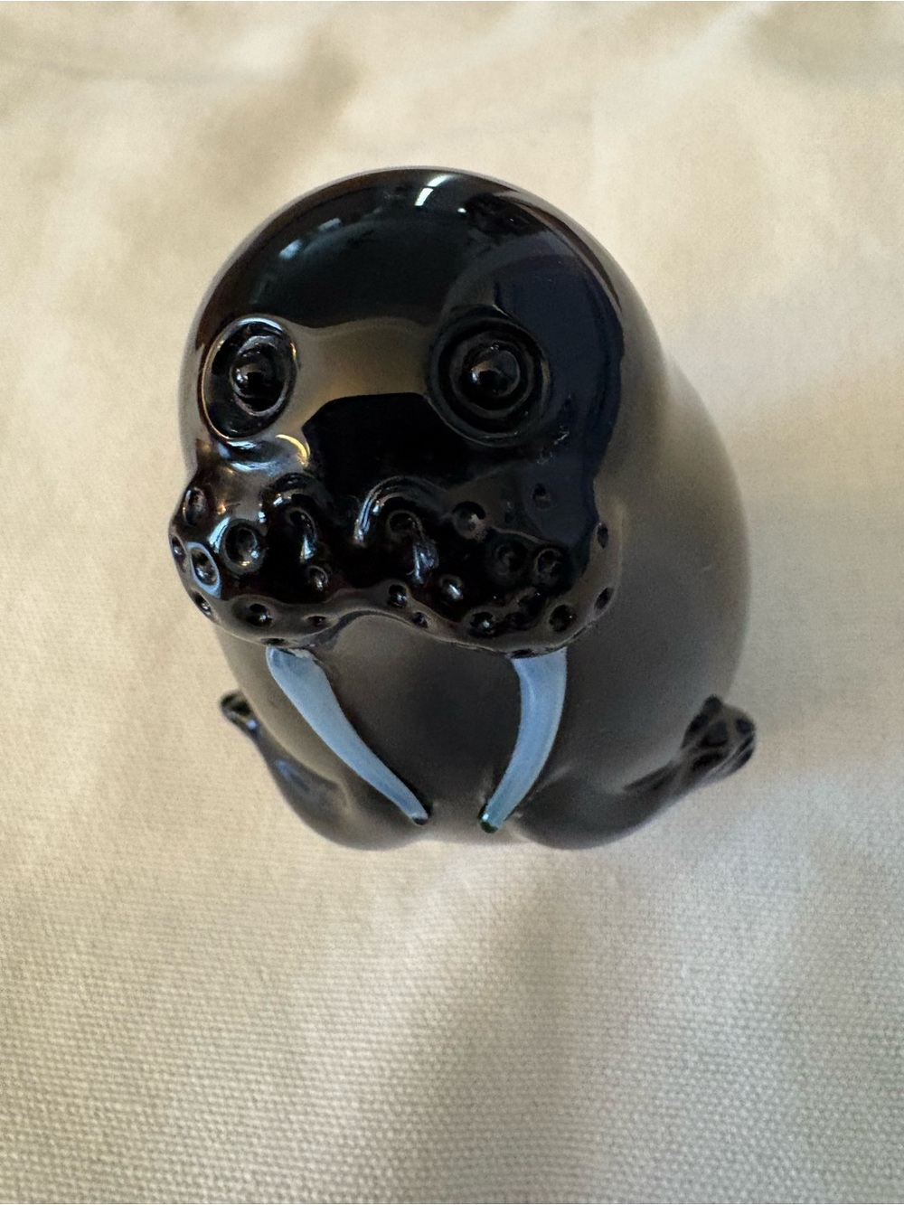 Orient & Flume Glossy Black Ceramic Walrus Figurine with White Tusks